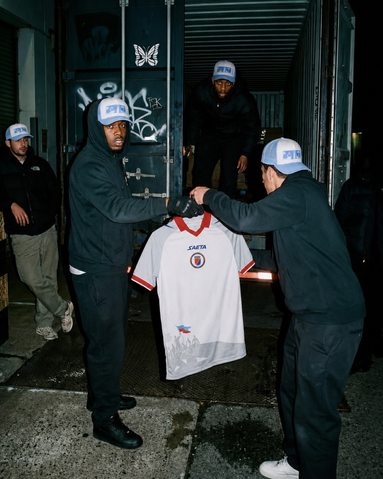 The Jiskaske jersey passed between figures on a night street